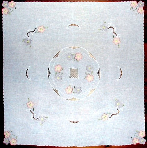 This beautiful table cloth is a a combination of cutwork, applique and lace with a decorative stitched edge.